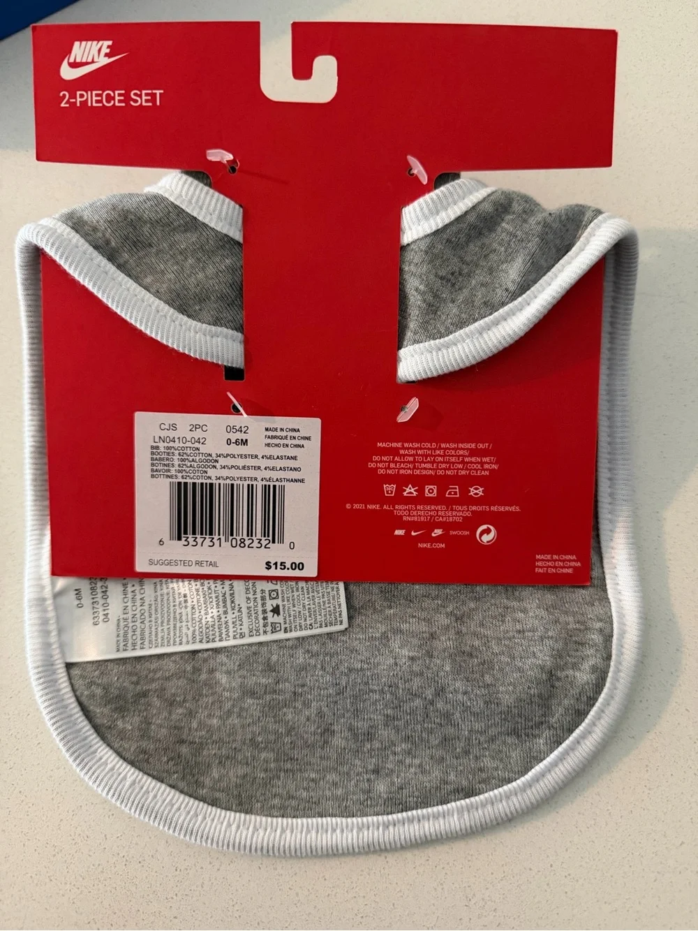 Nike Gray and White Baby Bib with Matching Booties